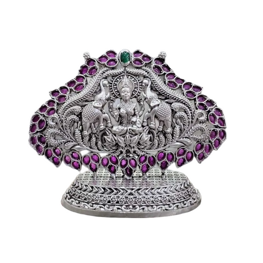 925 silver Gaja Laxmi idol with intricate floral and elephant design adorned with purple and green stones