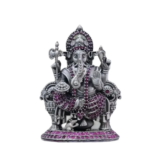Pure 925 silver ganesh idol adorned with intricate purple gemstone detailing in seated posture